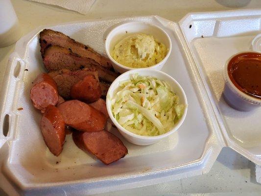 2 meat plate, brisket and sausage with coleslaw and potato salad. I recommend it all.