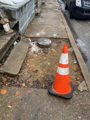 Jackhammer the sidewalk and dislodged the bottom step.