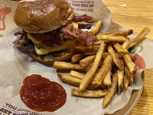 Ranch burger with fries.