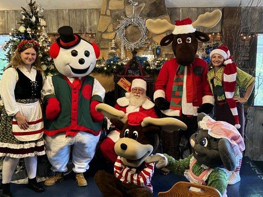 Holly, frosty, Santa, Chris moose, jolly, rowdy reindeer, Miranda mouse during breakfast with Santa