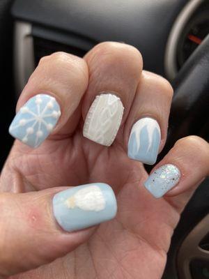 Winter is here!  Glitter ombre, icicles, winter sweater, snowflake, winter hat nails!