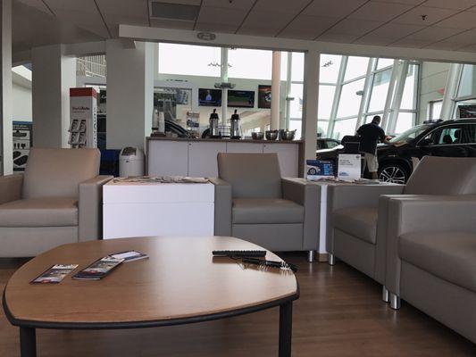 Waiting area with a view of the coffee bar and snack area