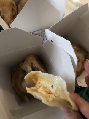 The dumplings aren't folded closed and half of them are just flopping open.