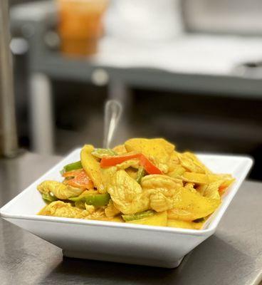 Mango Curry - Shrimp & Chicken with fresh mango in yellow curry with zucchini, bell peppers and tomato