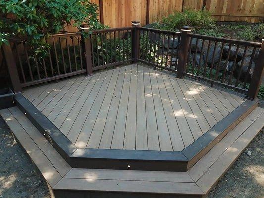 Custom Deck with railings and deck lighting built by Heilman Deck & Fence