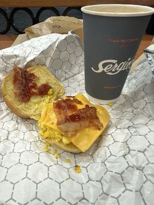 Bacon egg and cheese and coffee. $15.