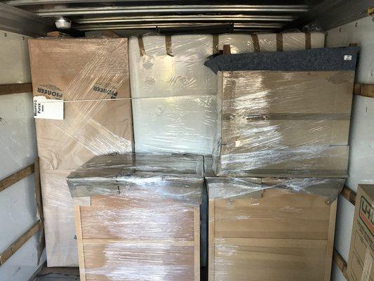 Rental truck we recently loaded heading to California with disposable 3 ply paper pads. Square, flat, tight ...real life Tetris.