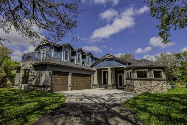 This two story custom designed home was built by Rotunda Homes in Odessa Florida.