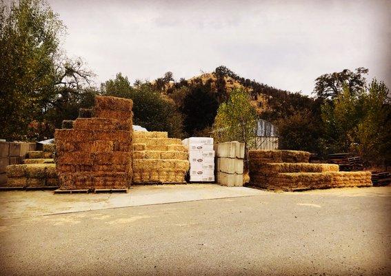 Freshly poured concrete will keep our hay out of the mud!