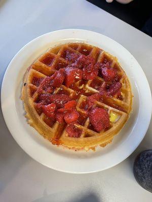 Belgium waffle with butter and strawberry topping