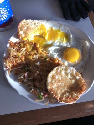 Western hash browns with eggs and English muffin ( already started to dig in)