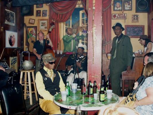 Little Freddy King(seated).Guitar Lightnin Lee(playing),Alabama Slim(standing).