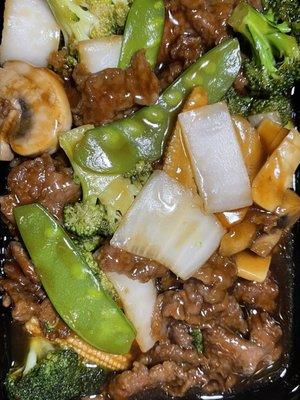 Beef with mixed vegetables close up