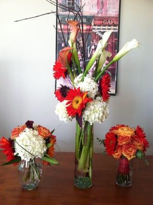 2 different table centerpieces and my bridesmaid's bouquet I got to keep after the wedding