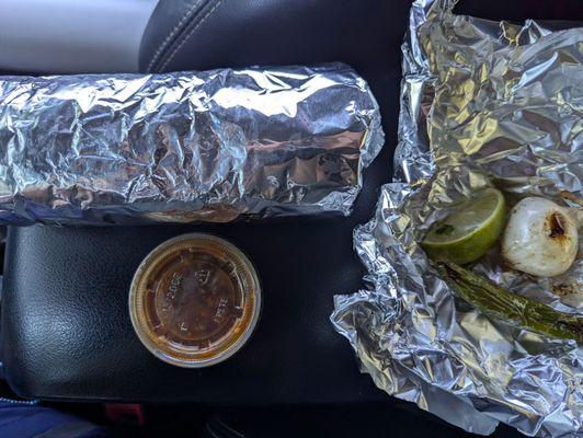 Super burrito, sauce, lime, grilled garlic and pepper