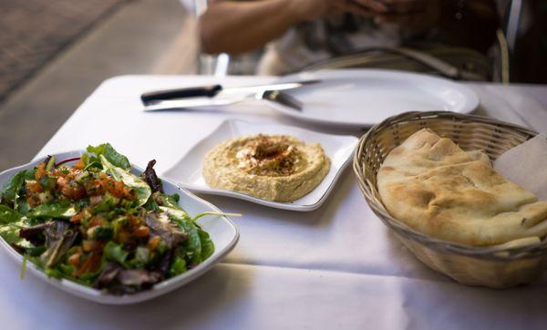 Pita and hummus with side salad