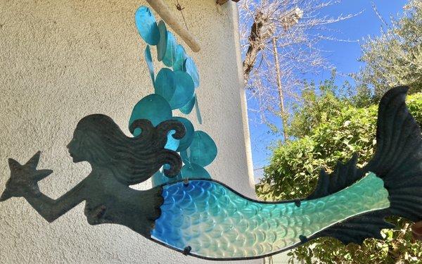 Beautiful mermaid and Capiz windchimes