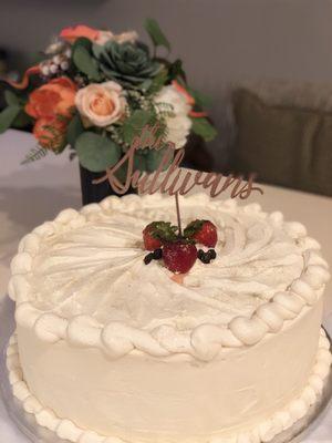 White chocolate mousse filling with strawberries, espresso, rum, and Italian buttercream decoration.