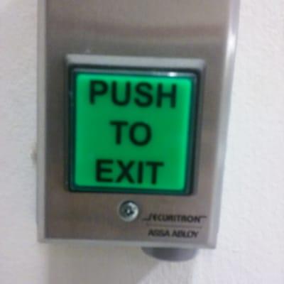 Doors lock on timer.  If you get locked in, use this button to open door.