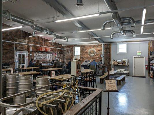 The tap room with the brewing operation open to see.