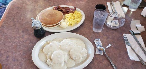 Biscuits and gravy, scrambled eggs bacon and pancakes