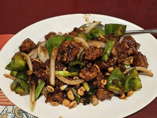 Kung pao - medium heat but really not spicy AT ALL. it's more of a sweet dish here.