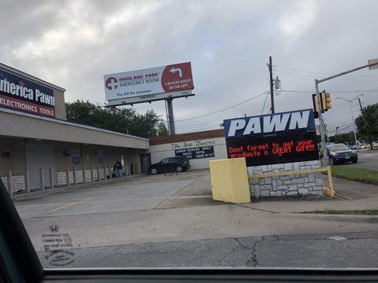 Homeless people sleeping out front in the morning.