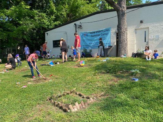 Stars students working on their family plot in our community garden