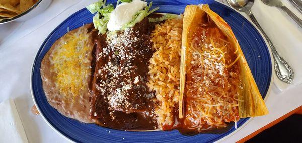 Three Item Combo with two chicken mole enchiladas and a pork tamale :)