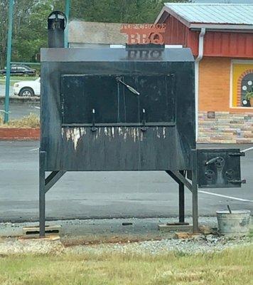 Smoker & sign.