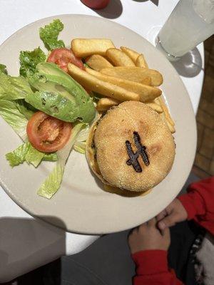 Their signature 1/2 lb. Hamburger Steak Lunch Special! Branded with their Initial.