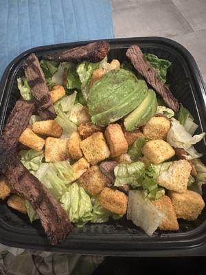 5 cold strips of skinny ass steak. Like 40 croutons and literally a handful of lettuce. Oh and then the brown avocado I'm paying extra for.