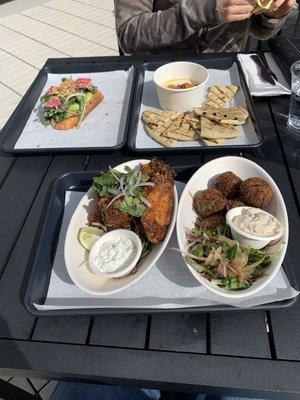 Avocado tartine, hummus, chicken wings and falafel fritters. All good!