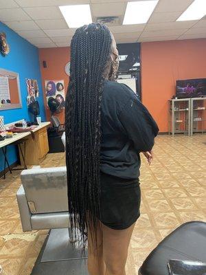 Long, knee-length, knotless box braids