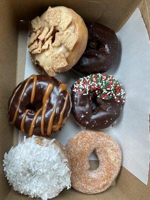 Cinnamon Toast Crunch, double chocolate, double chocolate with sprinkles, Twix, coconut, and old fashioned sugar/cinnamon. YUM!