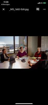 Beck Law Center team working together in a conference room.