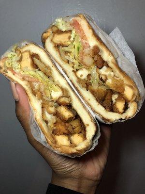 The "Heart attack" sandwich. (Chicken, mozzarella sticks, fries, lettuce and tomato)