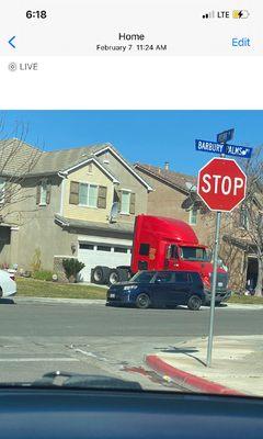 18 wheeler cab in driveway in community that Prescott manages