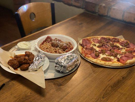 Boneless Chicken Wings, Spaghetti w bread, and Meat Lovers Pizza