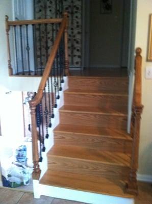 After- Stained, polyurethaned and installed wood and iron railing!