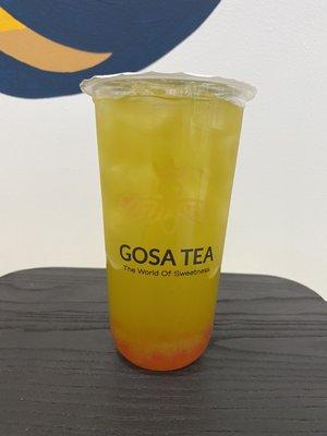 Kiwi tea with strawberry boba