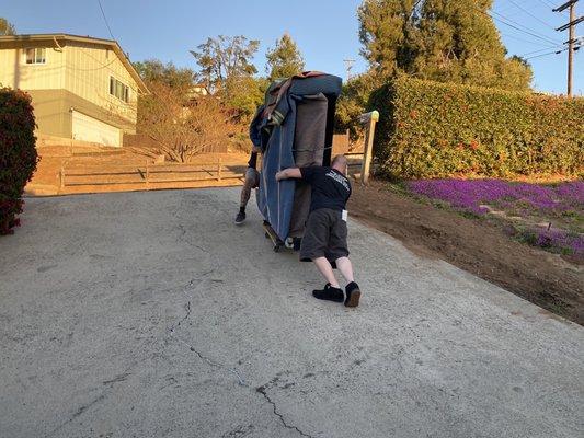 Look at their body mechanics. This driveway is really really steep and these guys handled it NO PROBLEM.