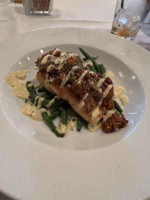 Salmon with chorizo over green beans with aioli