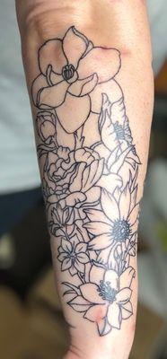 Floral tattoo outline (soon to be shaded and colored) done by tattooist Anthony Audy.