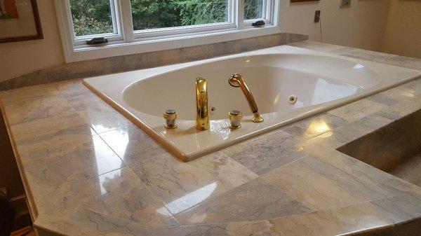 Polished marble Jacuzzi tub deck