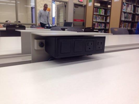 Power plug on their study tables to charge your e-devices.