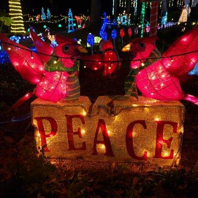 Cardinals and Peace sign.  The Prince of Peace is the reason we celebrate.  May you and your family have peace this Christmas season.