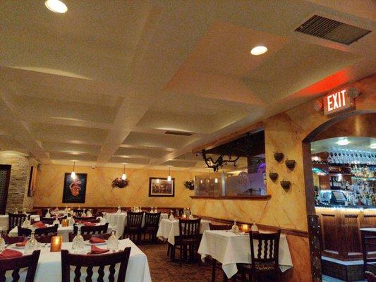 Dining room with a peek at the bar to the right