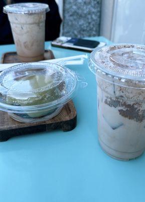 Iced chai latte with oat milk/2% milk and pistachio dessert