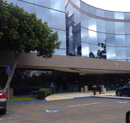 Entrance to the building. Walk through glass doors and he's right through the courtyard.